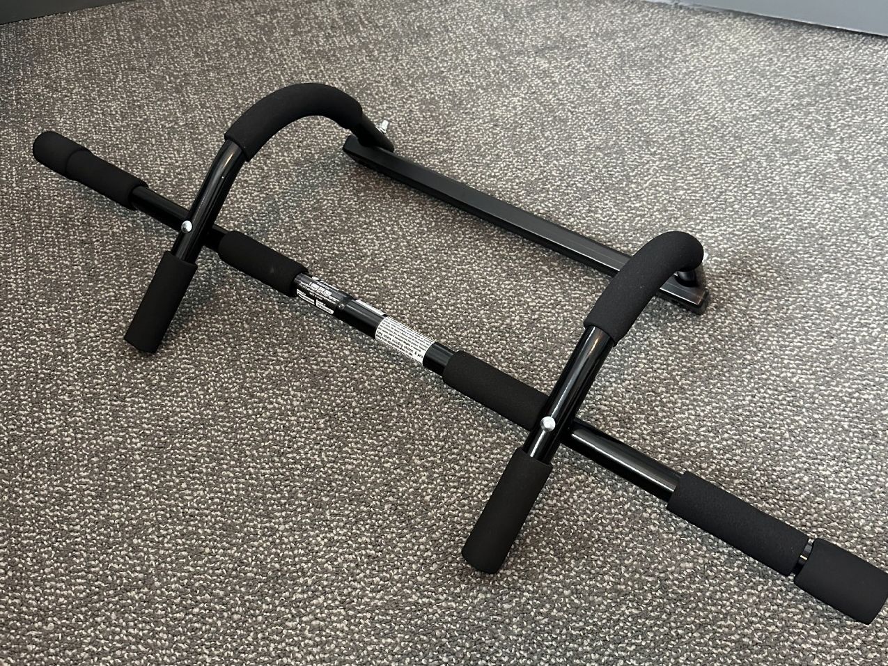 The commercial doorway pull-up bar before disassembly